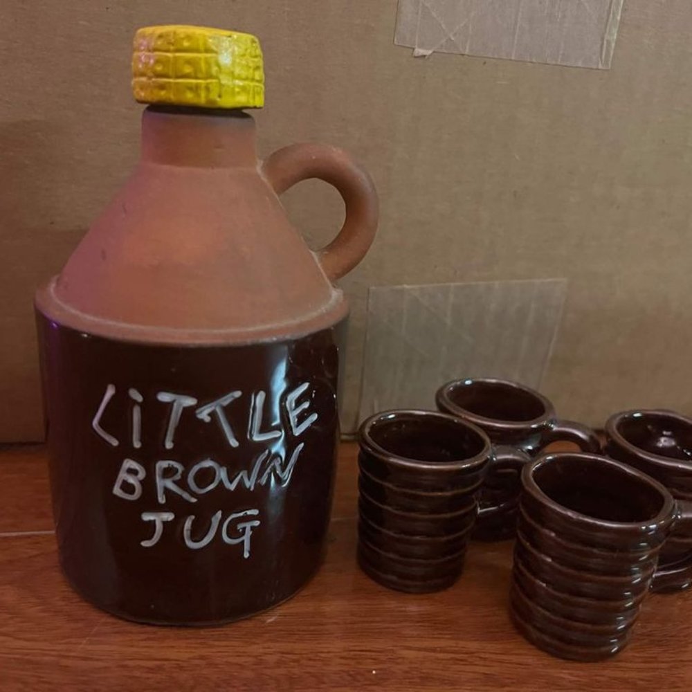 Little brown jug and ceramic mugs